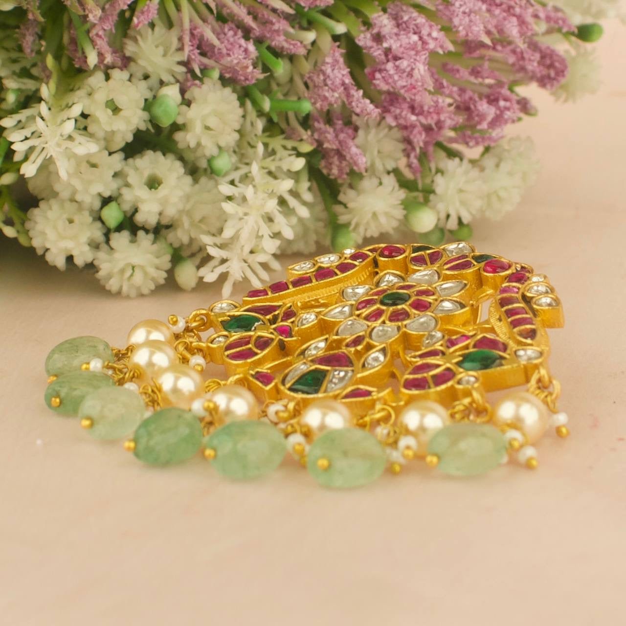 Classic jadau kundan locket with guttapusalu hanging, green beads, and pearls