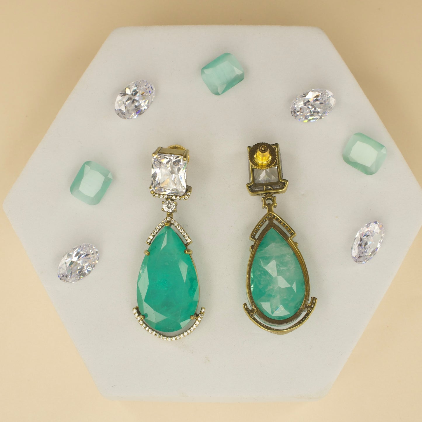 Fancy yet classic stone hanging earrings with victorian finish available in red, green, purple & mint