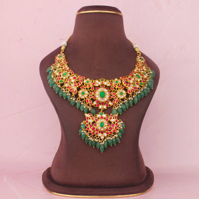 Radiant Jadau Kundan Floral Necklace With Green Hangings