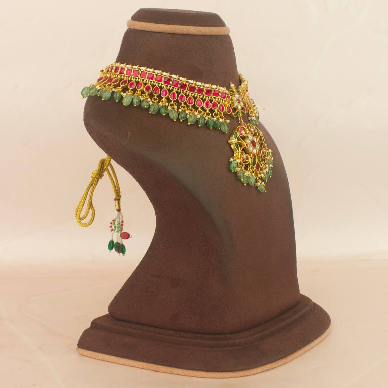Jadau kundan choker with locket, pink stones and green beads