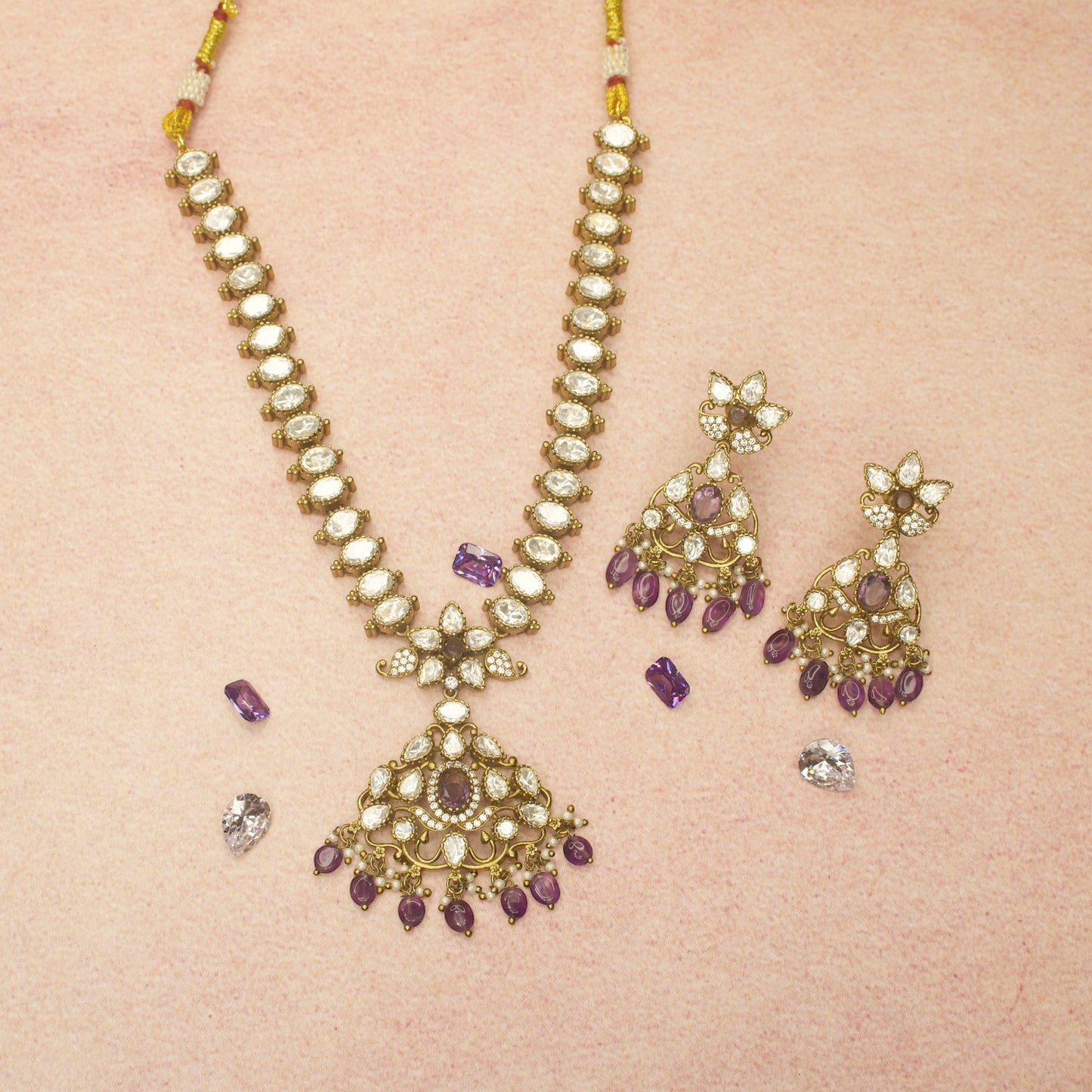 Elegant Victorian Polki Nekclace Set with AD stones. This Victorian Jewellery is available in Red,Green & Purple colour variants.