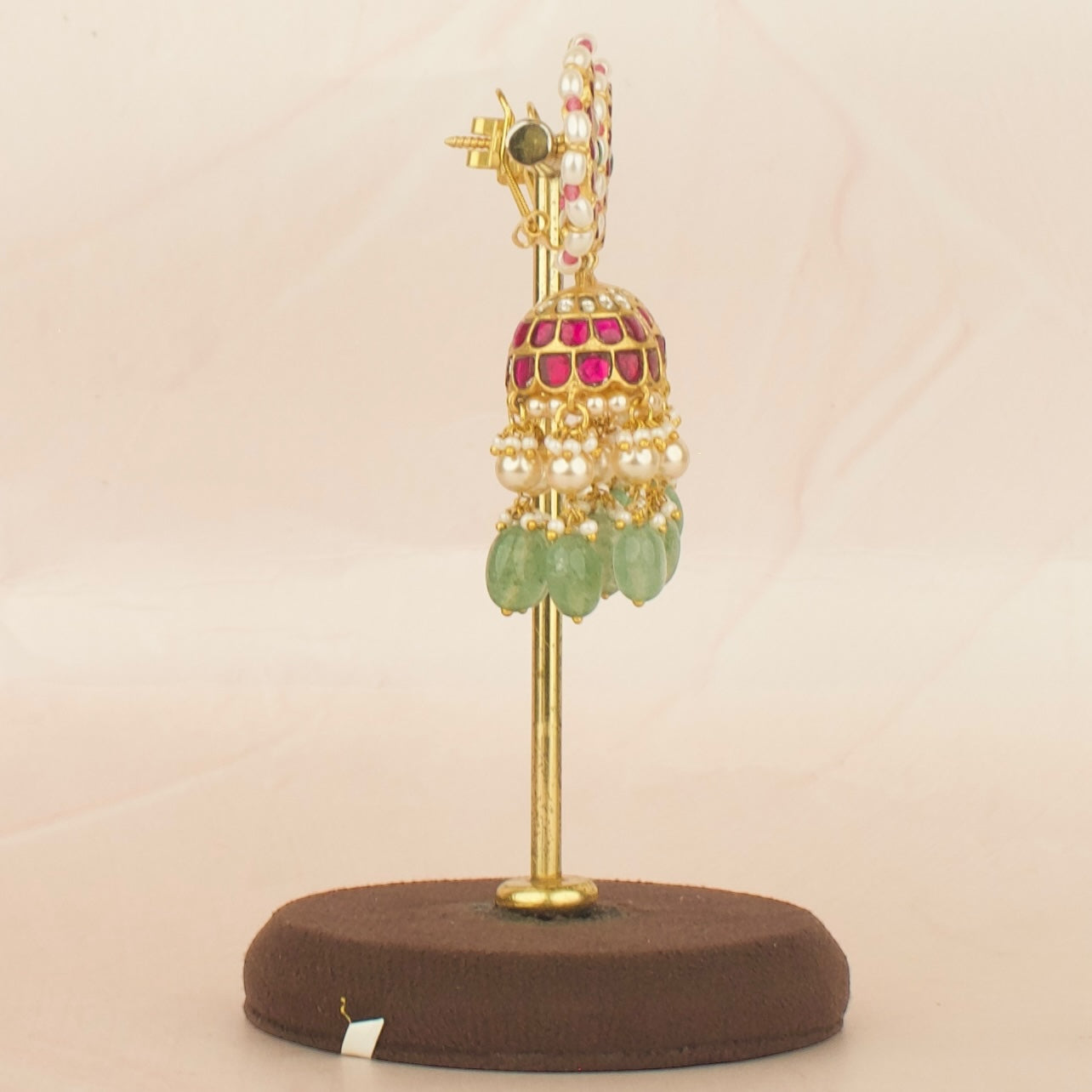 Intricate floral Design Studded Jadau Kundan Jhumki with Green beads