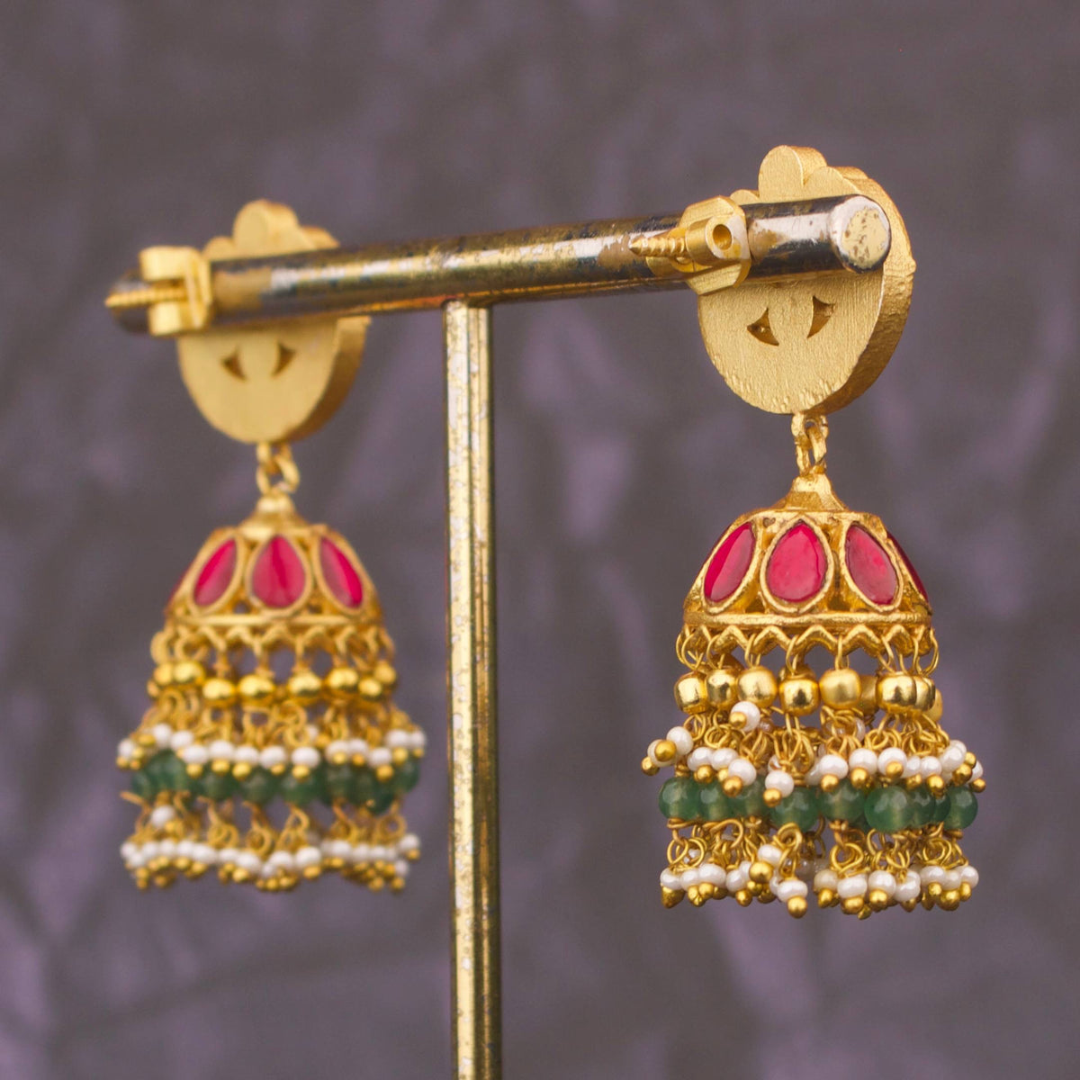 Close-up detailing of Chand Studded Jadau Kundan Jhumki Earrings With Guttapusalu Hangings