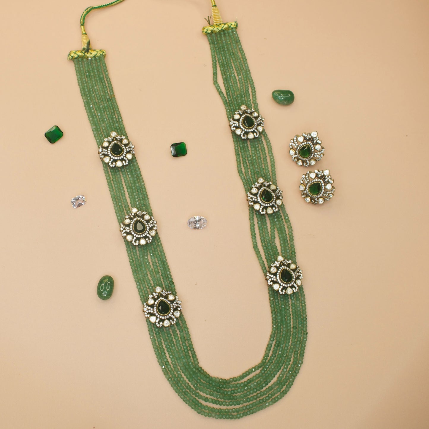Classic Layered Necklace with Victorian Polki Side Lockets. This Victorian Jewellery Is available in Purple & Green colour varaiants.