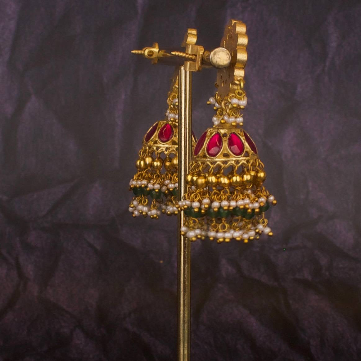 Floral Studded Guttapusalu Jhumki Earrings With Green Beads