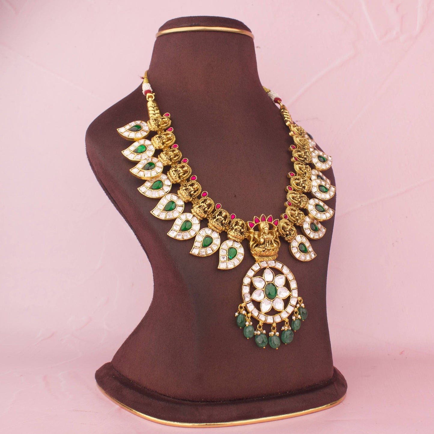Mahalakshmi Temple Bridal Necklace With Antique Gold Finish And Emerald Drops