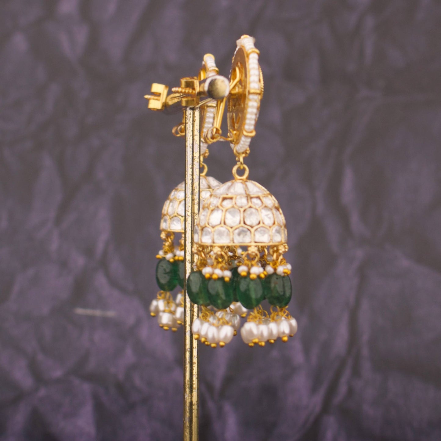 White Polki Kundan Jhumka Earrings With Green Beads