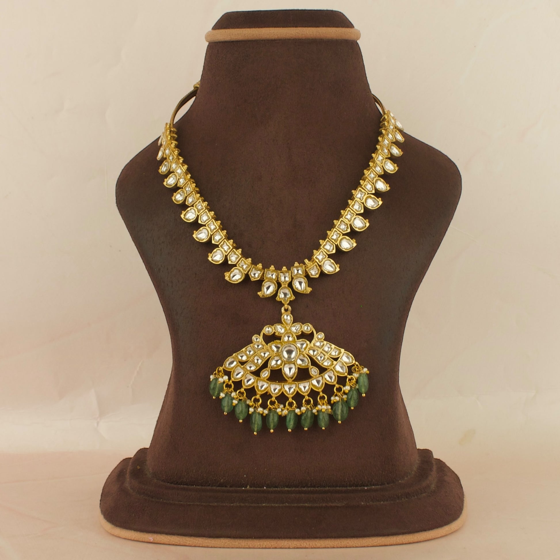 Dazzling Floral Design Locket Jadau Kundan Necklace with Green beads