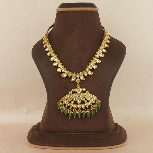 Dazzling Floral Design Locket Jadau Kundan Necklace with Green beads