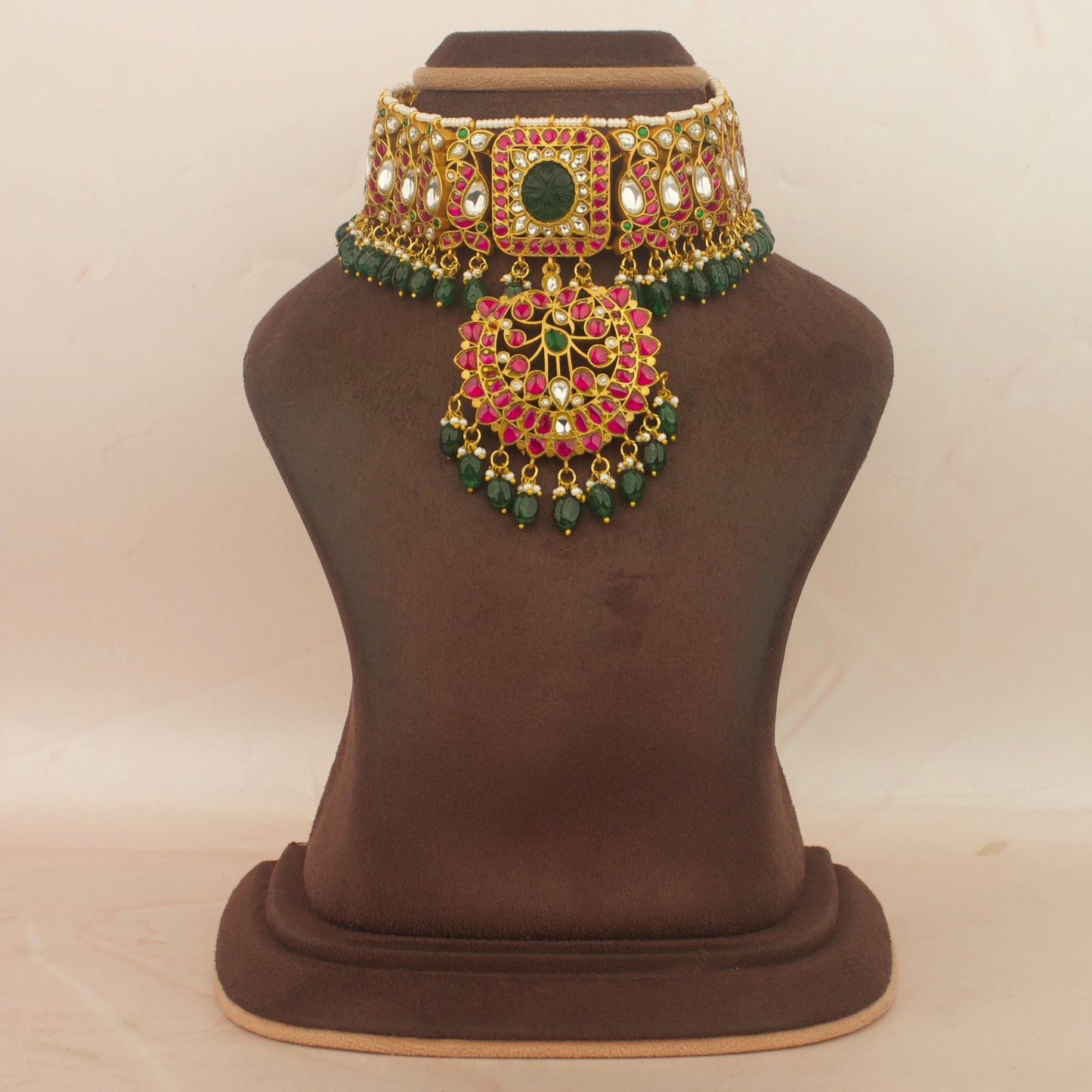 Traditional Indian bridal jadau kundan choker with gold-tone and pink and green stones