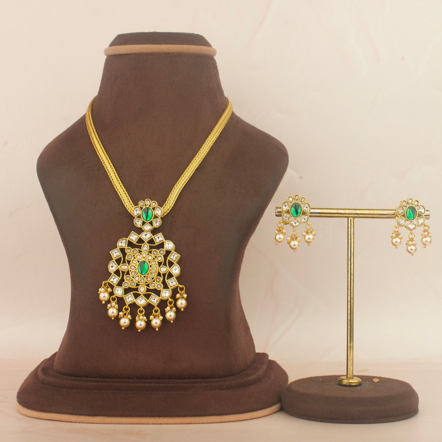 Jadau kundan nantad necklace set with green stones and pearl drops