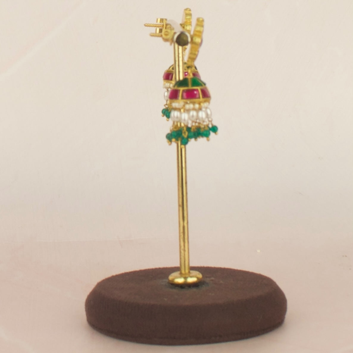 Unique floral design Jadau Kundan Jhumki with Ricepearl and Green Bead as Hanging, perfect for elegant occasions.