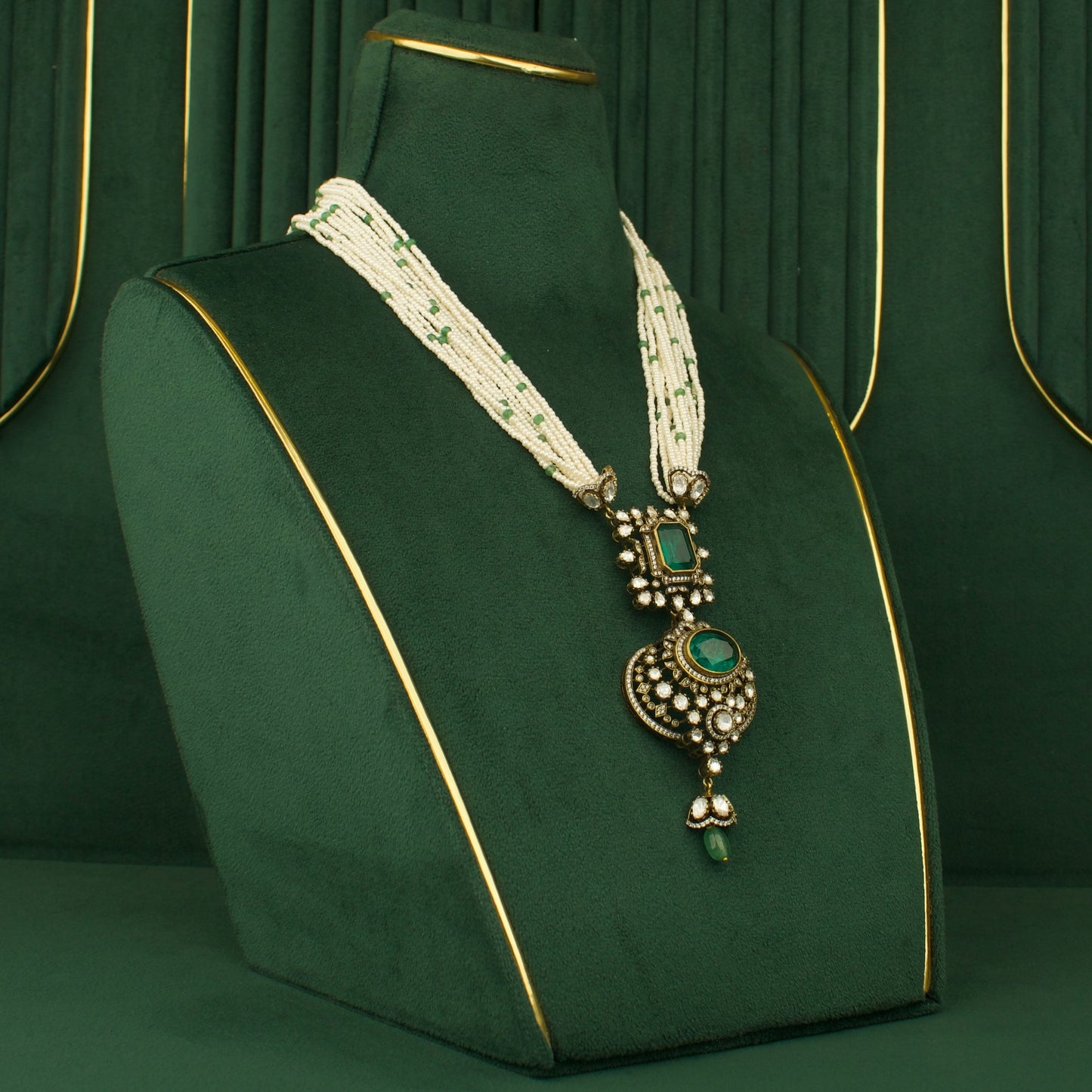 Royal Chandbali polki necklace with emerald green pendant and white bead strands