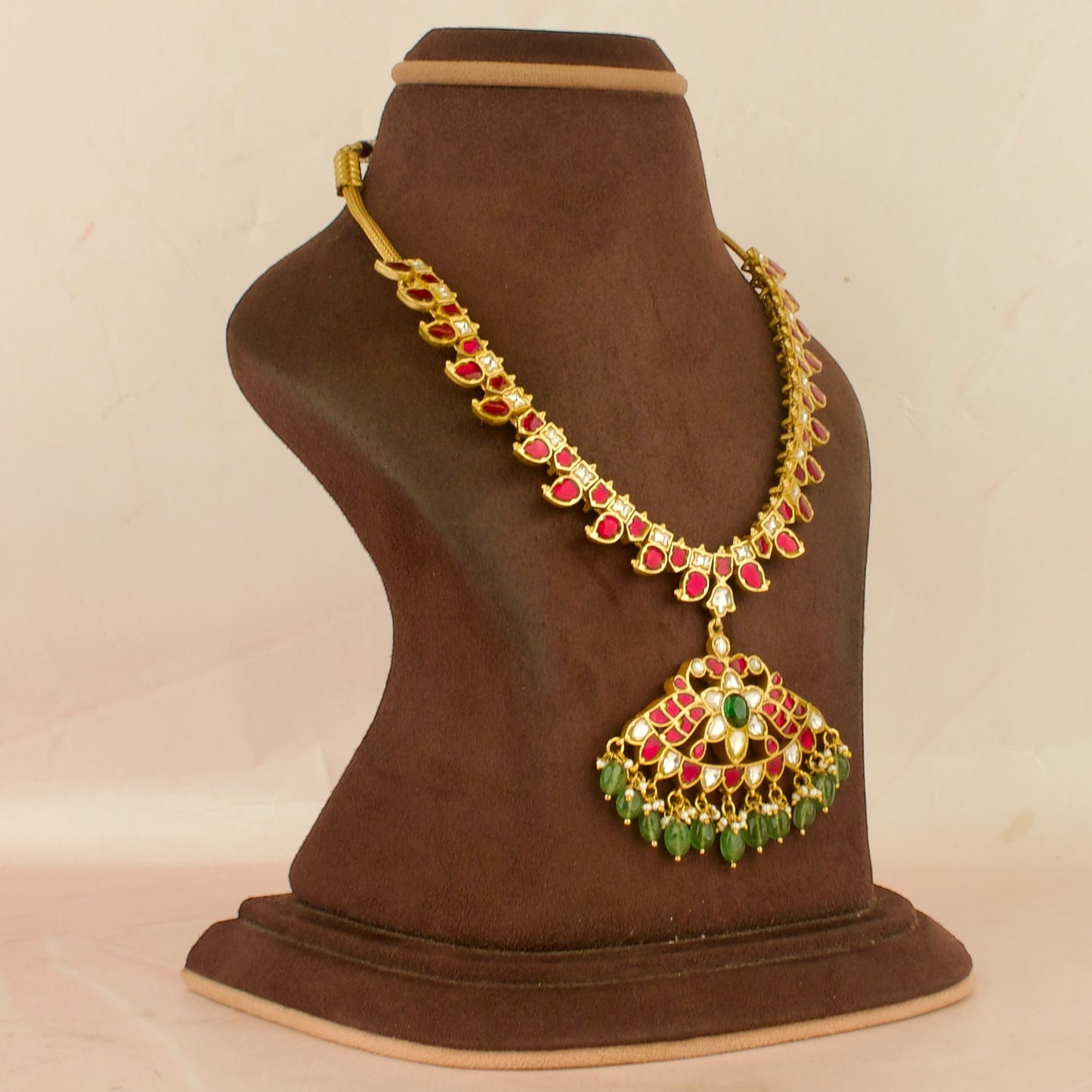 Dazzling Floral Design Locket Jadau Kundan Necklace with Green beads