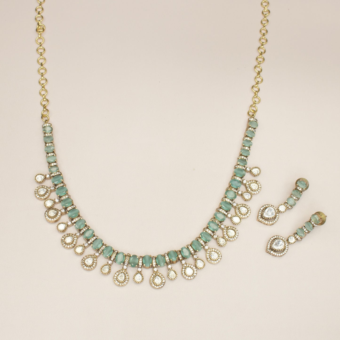 Trending One-Line Victorian Necklace Set with drop earrings. This Victorian Jewellery is available in Mint,Red,Green & Purple colour variants.