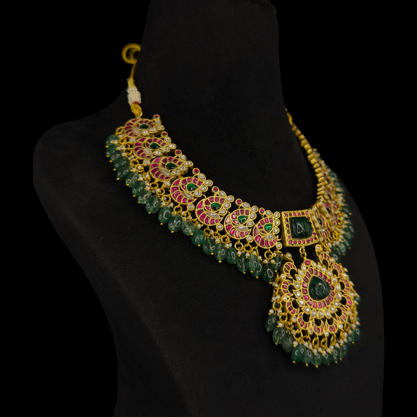 Elegant Jadau Kundan Necklace with Emerald Bead Accents with 22k gold plating This product belongs to Jadau Kundan jewellery category