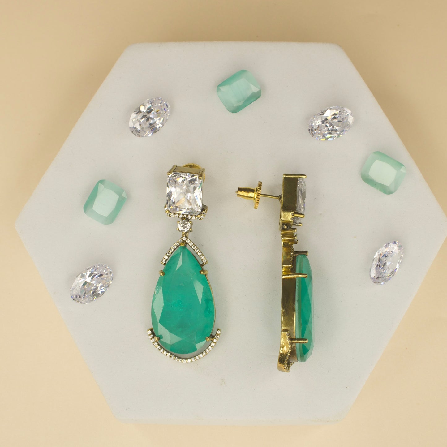 Fancy yet classic stone hanging earrings with victorian finish available in red, green, purple & mint