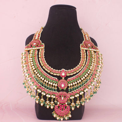 Opulent Indian Bridal Necklace With Layered Kundan Design And Emerald Beads
