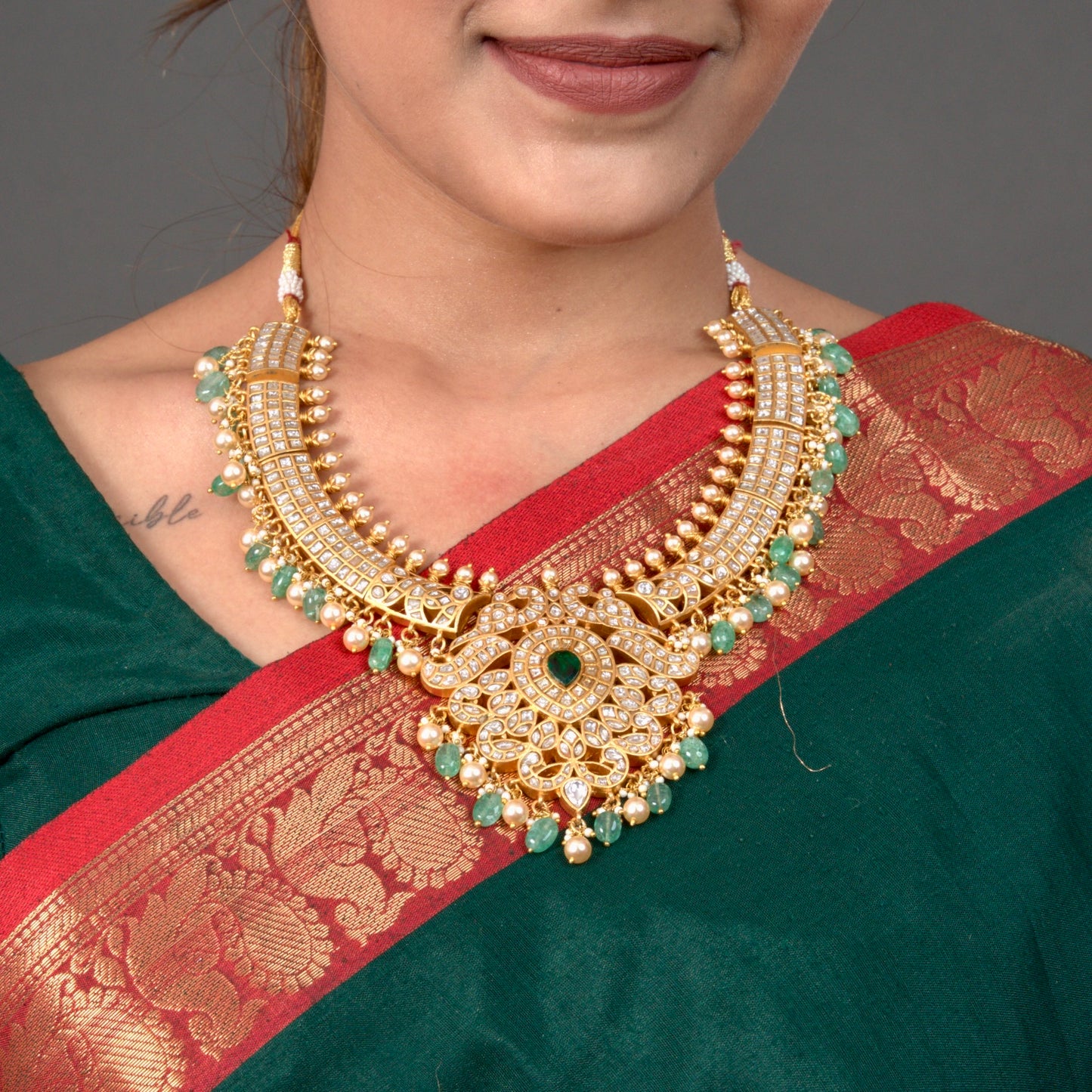 Regal Radiance Jadau Kundan Kanti style Necklace iwith 22c gold platingThis product belongs to Jadau Kundan jewellery category