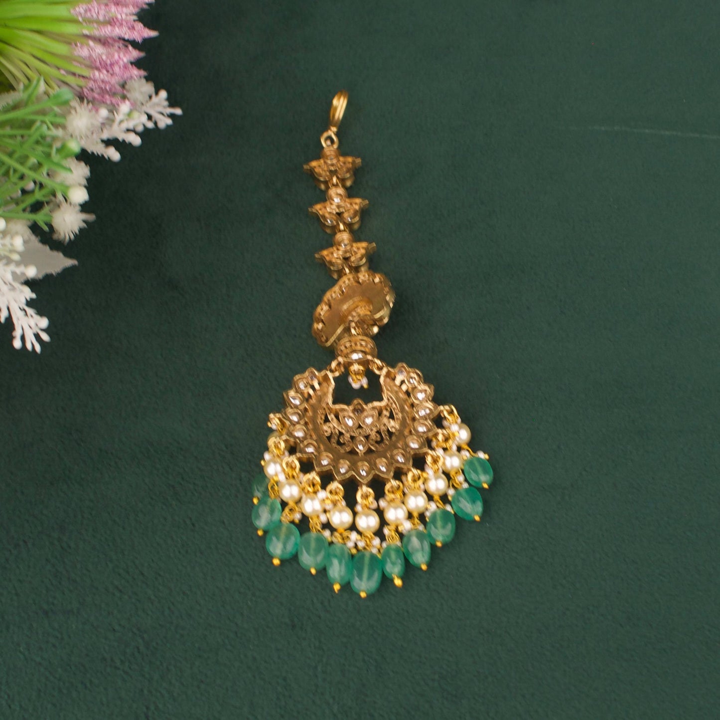Side view of premium Elegant Victorian Maang Tikka With Pearl And Emerald Hangings