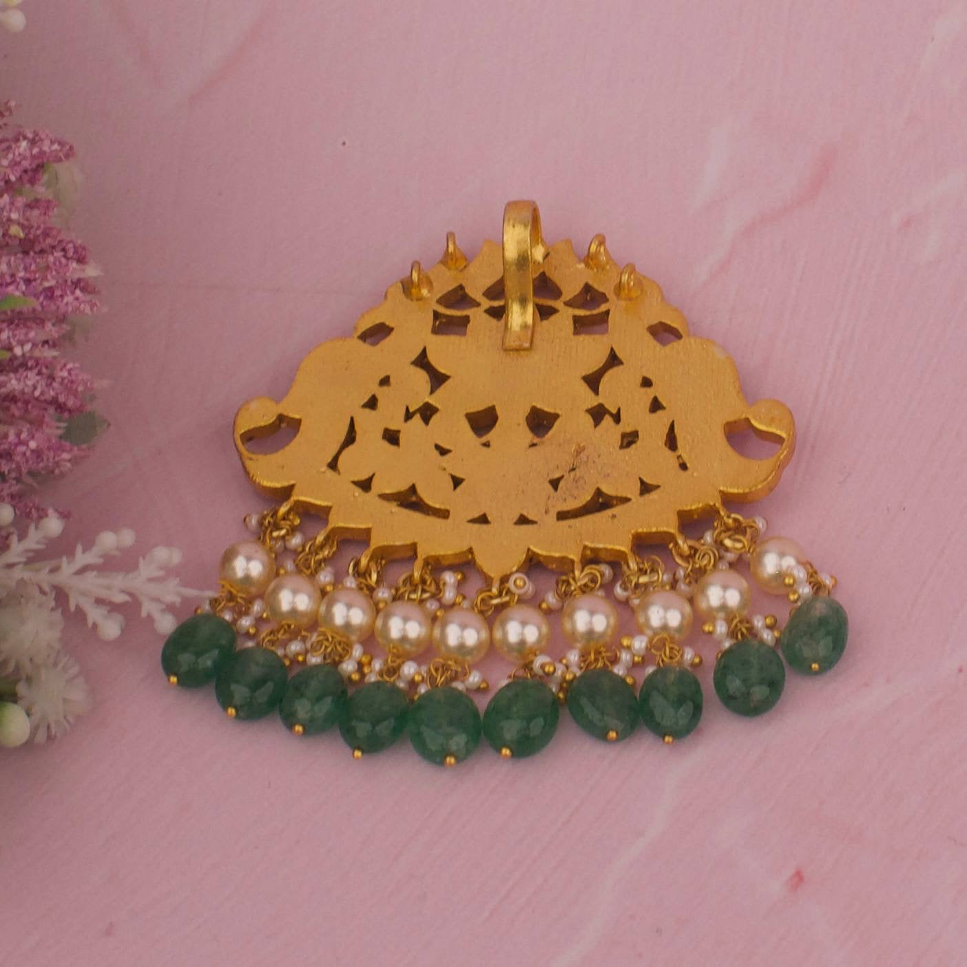 Side view of premium Floral Jadau Kundan Locket With Strawberry Beads showcasing handcrafted
