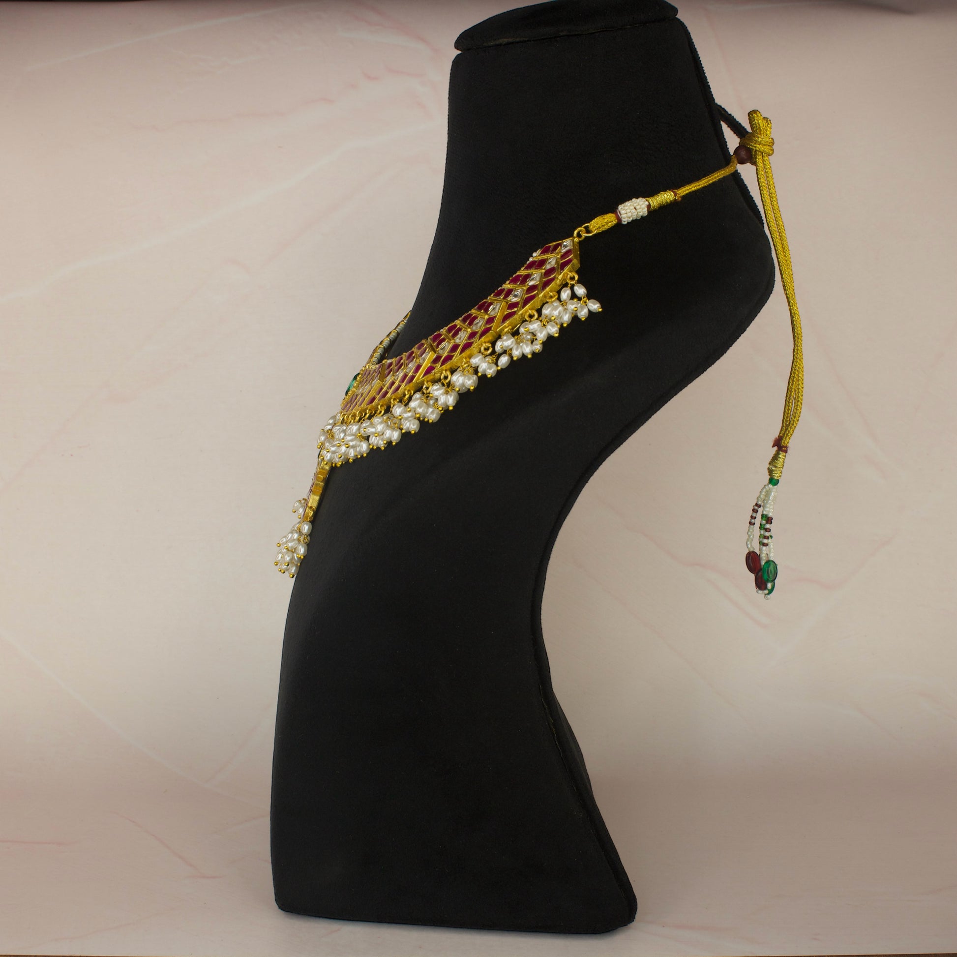Guttapusalu Jadau Kundan Necklace with Rice Pearls with 22k gold plating. This product belongs to Jadau Kundan Jewellery category