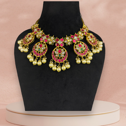 Regal Jadau Kundan Bottumala Necklace with Pearls and Floral Motifs with 22k gold platingThis product belongs to Jadau Kundan jewellery category