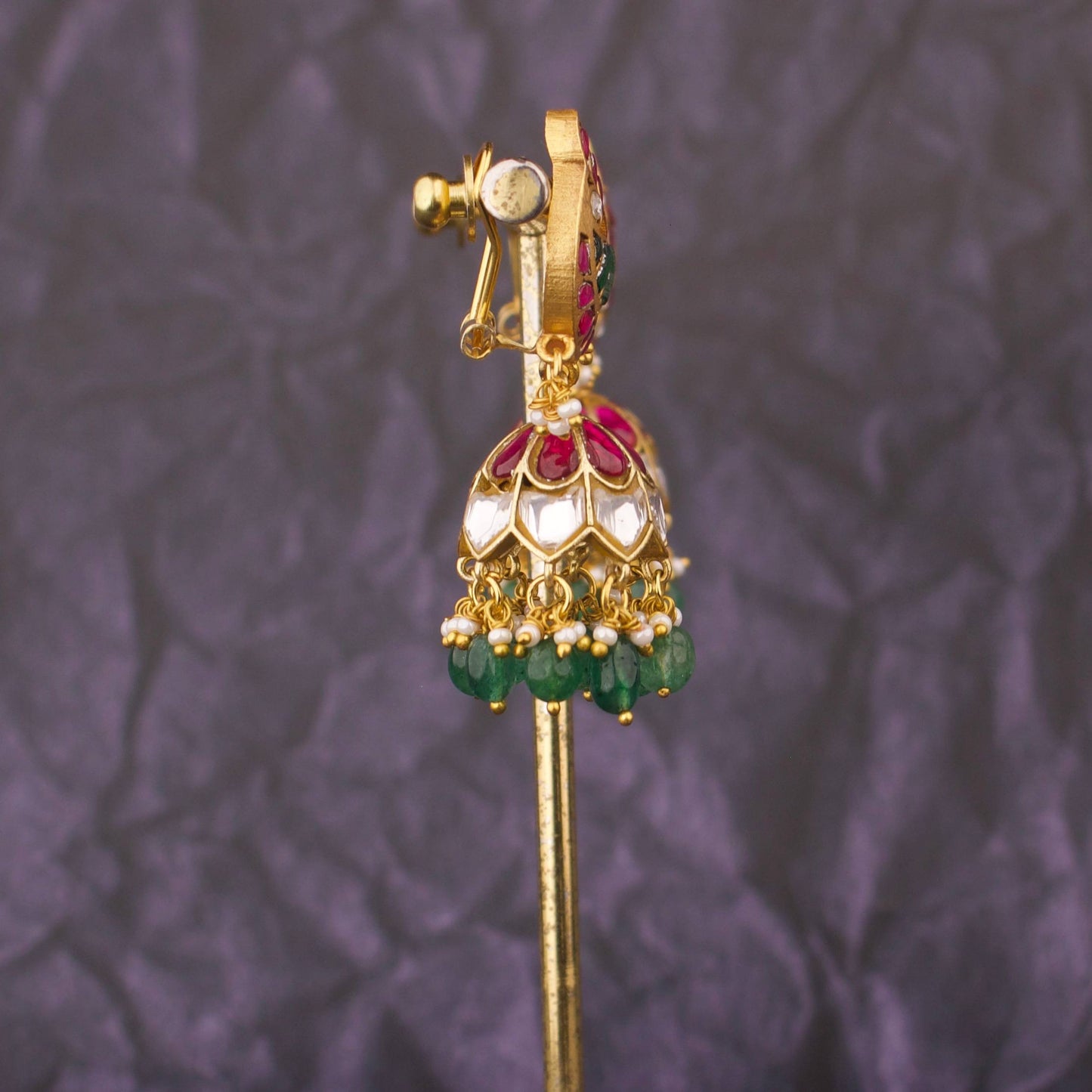 Elegant Gold Finish Jadau Kundan Jhumka Earrings With Green Beads And Pearls