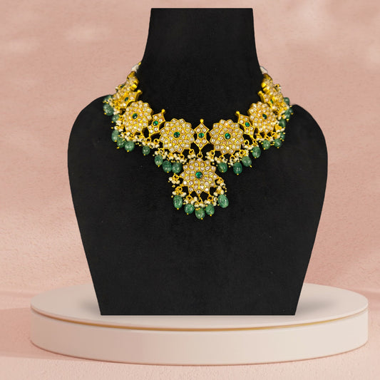 Exquisite Floral Symphony Jadau Kundan Necklace with Emerald Beads with 22k gold plating This product belongs in jadau kundan jewellery category