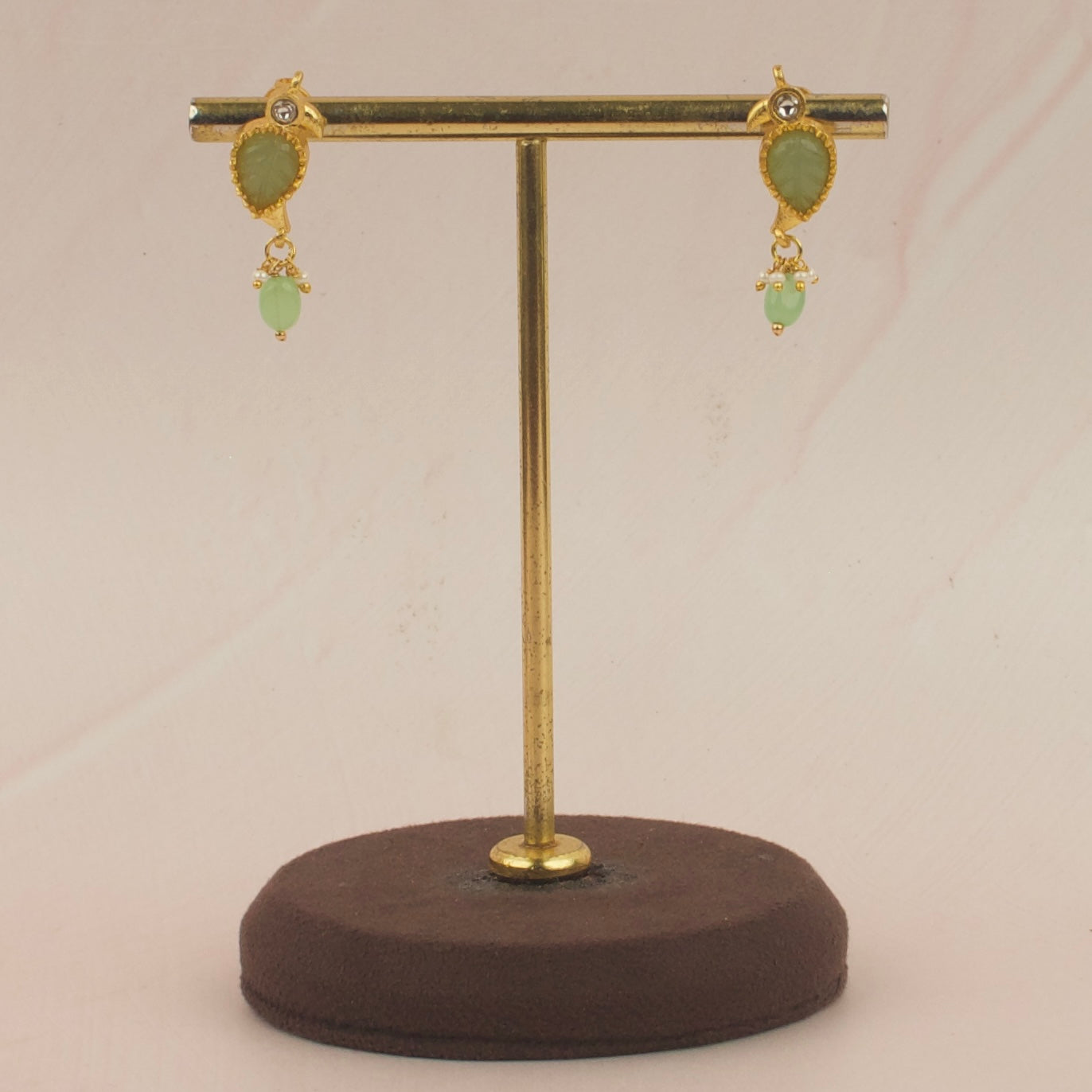 Leaf-Motif Jadau Kundan Earrings with Green Stone Drop