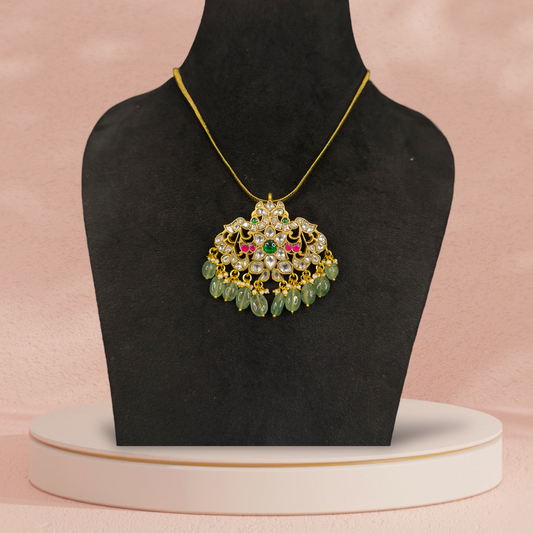 Elegant Jadau Kundan Chain Pendant Necklace with Green Bead Accents with 22k gold plating this product belongs to jadau kundan jewellery catigory