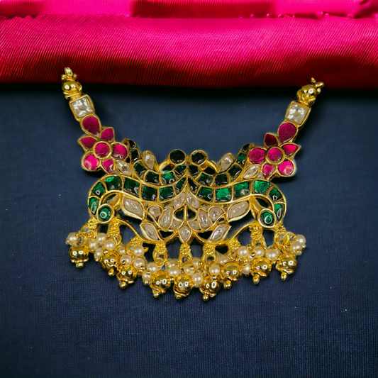 Beautiful Peacock Jadau Kundan Pendant with 22k gold plating. this product belongs to jadau kundan jewellery category