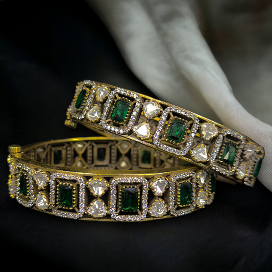 Traditional Victorian Polki Bangles with AD stones. This Victorian Jewellery is available in Green & Purple colour variants. 