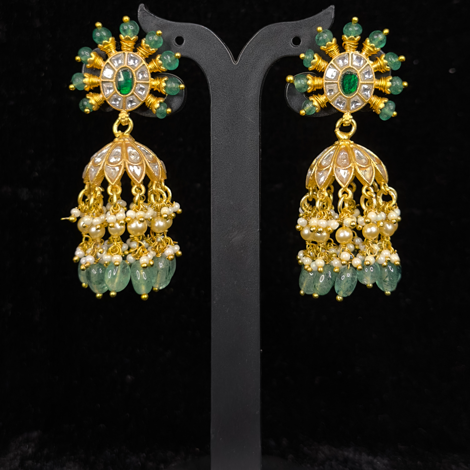 Majestic Green Blossom Jadau Kundan Jhumkas with 22k gold plating. this product belongs to jadau kundan jewellery category