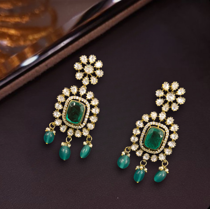 Victorian Moissanite Polki Earrings with zircon stones, beads and pearls. This Victorian Jewellery is available in a Green colour variant. 