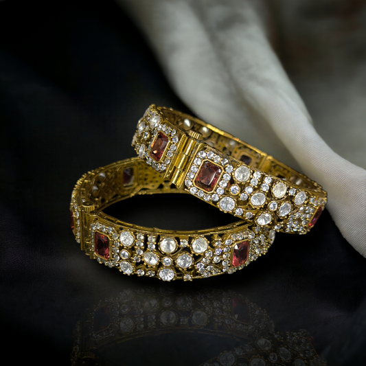 Diamond look Victorian Polki Bangles with screw enclosure. This Victorian Jewellery is available in a Red colour variant. 