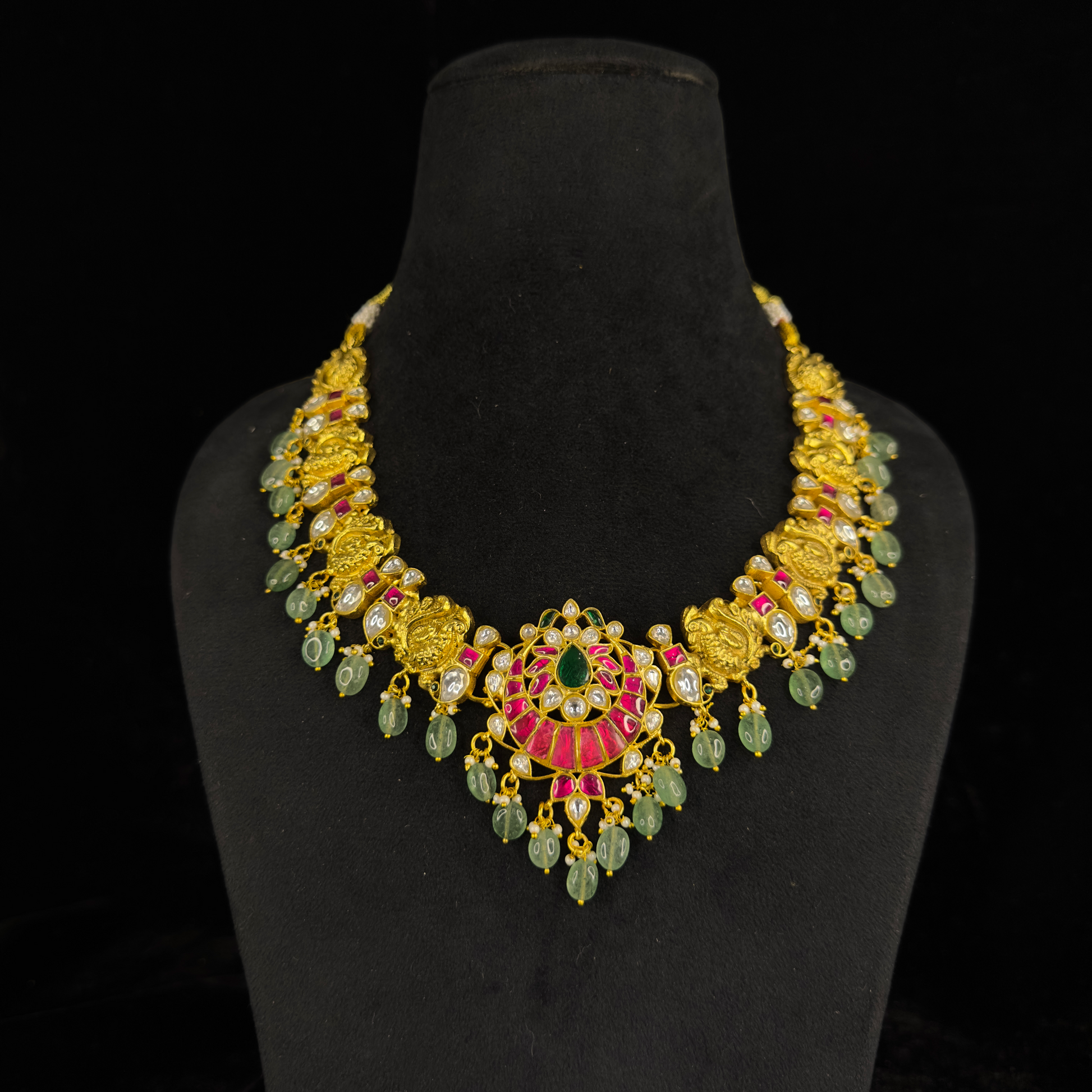 legant Floral Motif Jadau Kundan Necklace with Green Beads with 22k gold platingThis Product Belongs to Jadau Kundan Jewellery Category