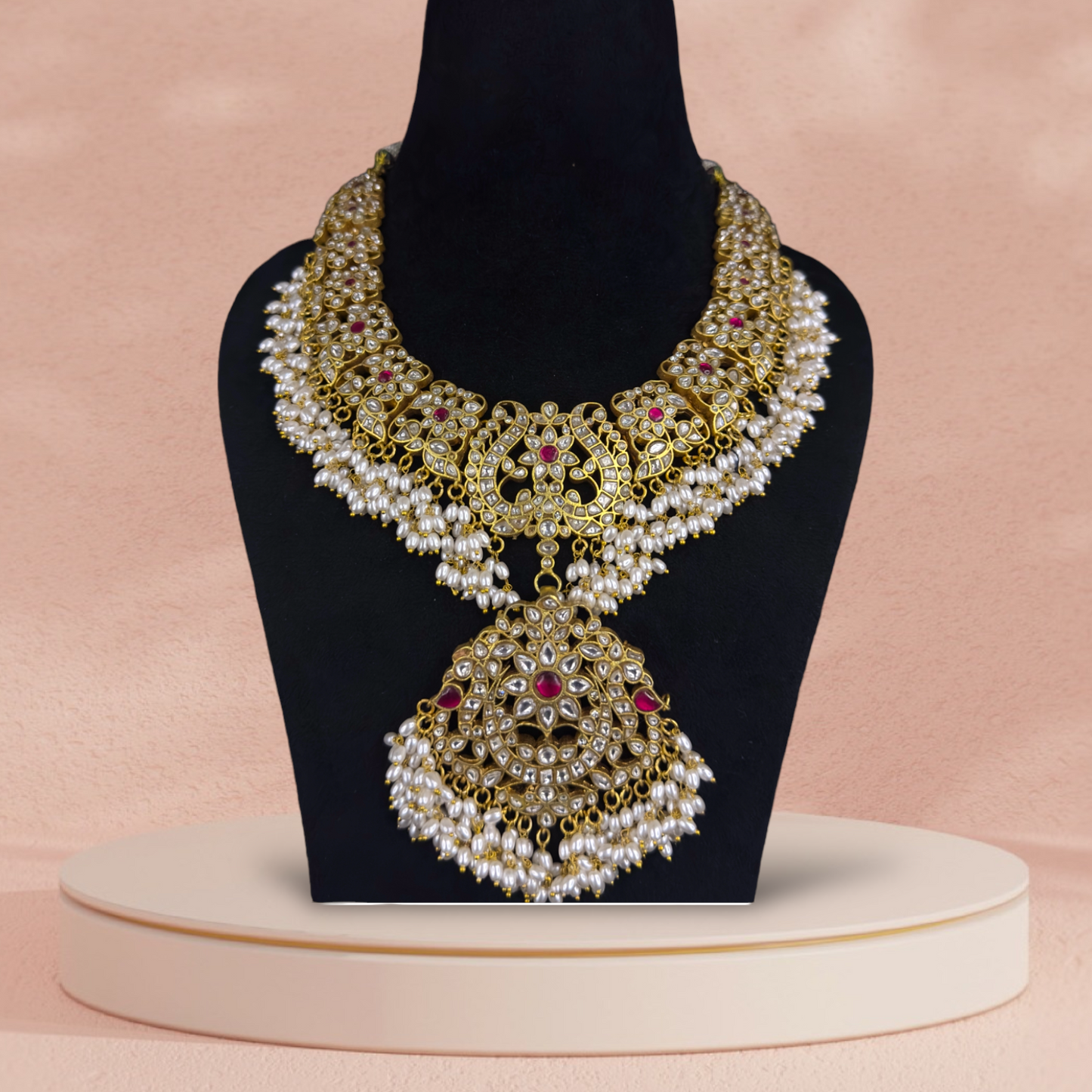 Elegant Jadau Kundan Guttapusulu Necklace in 22k gold platingThis product belongs to Jadau Kundan jewellery category 