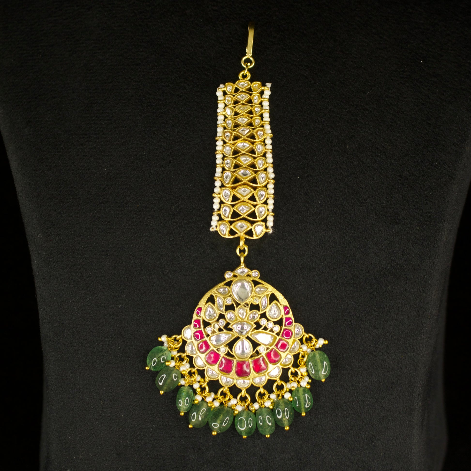 Bridal Gold Plated Jadau Kundan Maang Tikka in black background