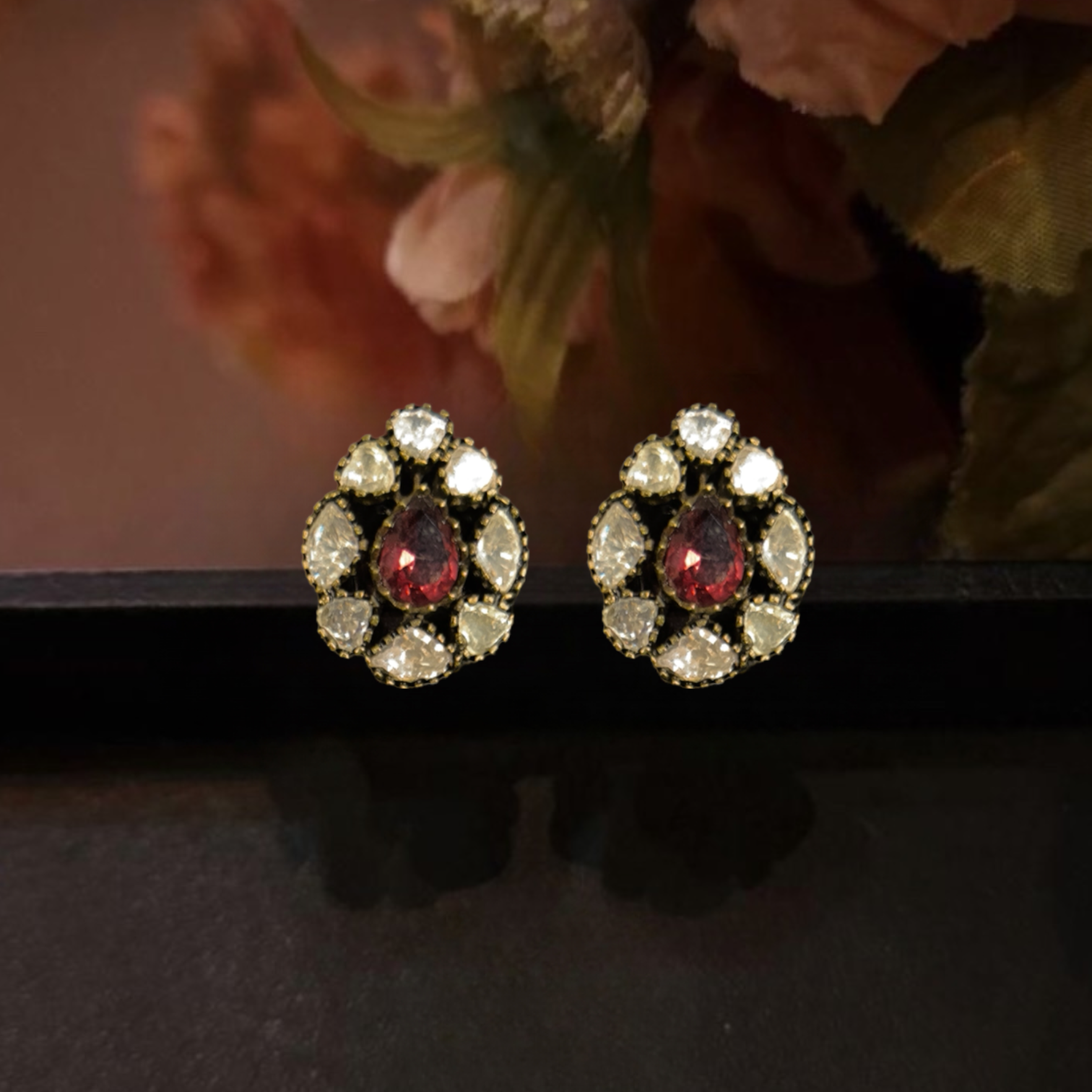Moissanite polki Victorian Stud Earrings. This Victorian Jewellery is available in Red & Purple colour variants. 