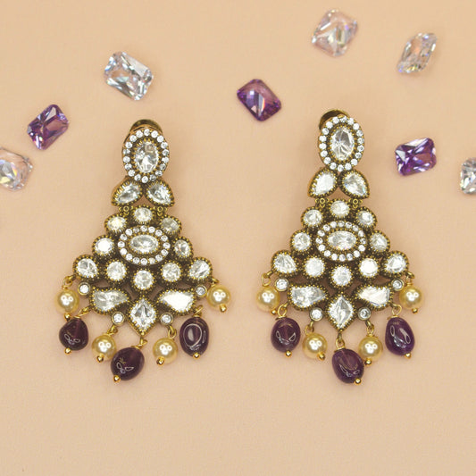 Gorgeous Victorian Earrings with Polki, zircon, pearls, and beads. This Victorian Jewellery is available in Purple, Mint, & Orchid colour variants.
