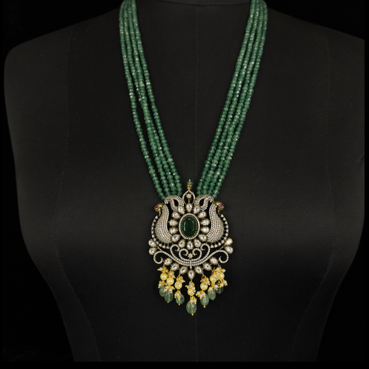 Green Victorian Beads Mala set with Peacock motif & pearl drops. This Victorian Jewellery is available in a Green colour variant. 