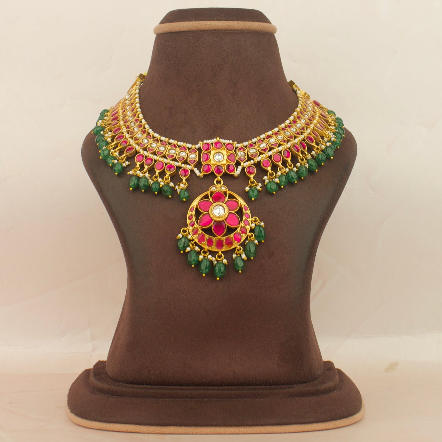 jadau kundan choker necklace with red stones and green bead fringe