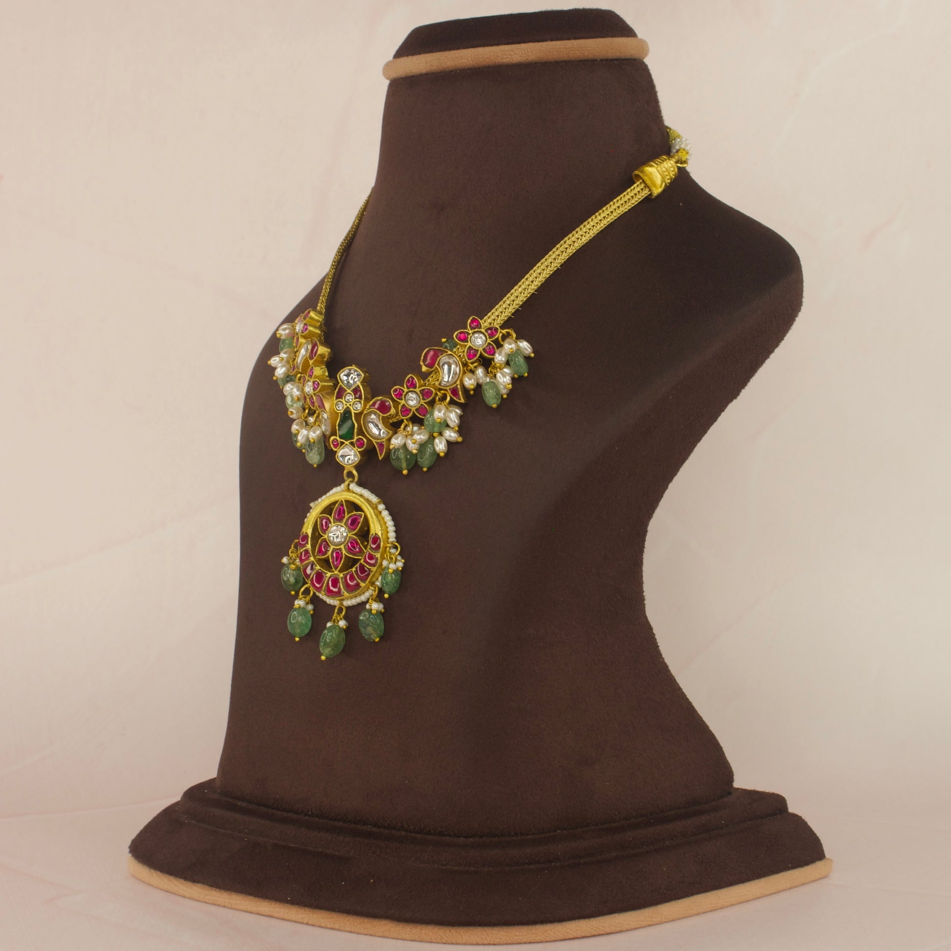 Elegant Floral Jadau Kundan Necklace with Green Beads and Pearl Accents with 22k gold plating. This Product Belongs to Jadau Kundan Jewellery Category