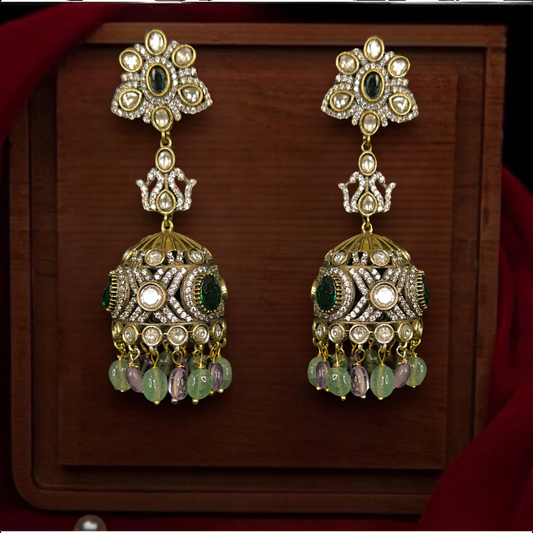 Timeless Victorian Zircon Jhumka. This Victorian Jewellery Is available in Red & Green colour varaiants. 