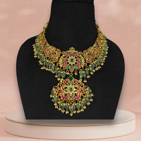 Opulent Floral Design Jadau Kundan Necklace with Green Bead Drops with 22k gold plating This product belongs to Jadau KUndan jewellery Category