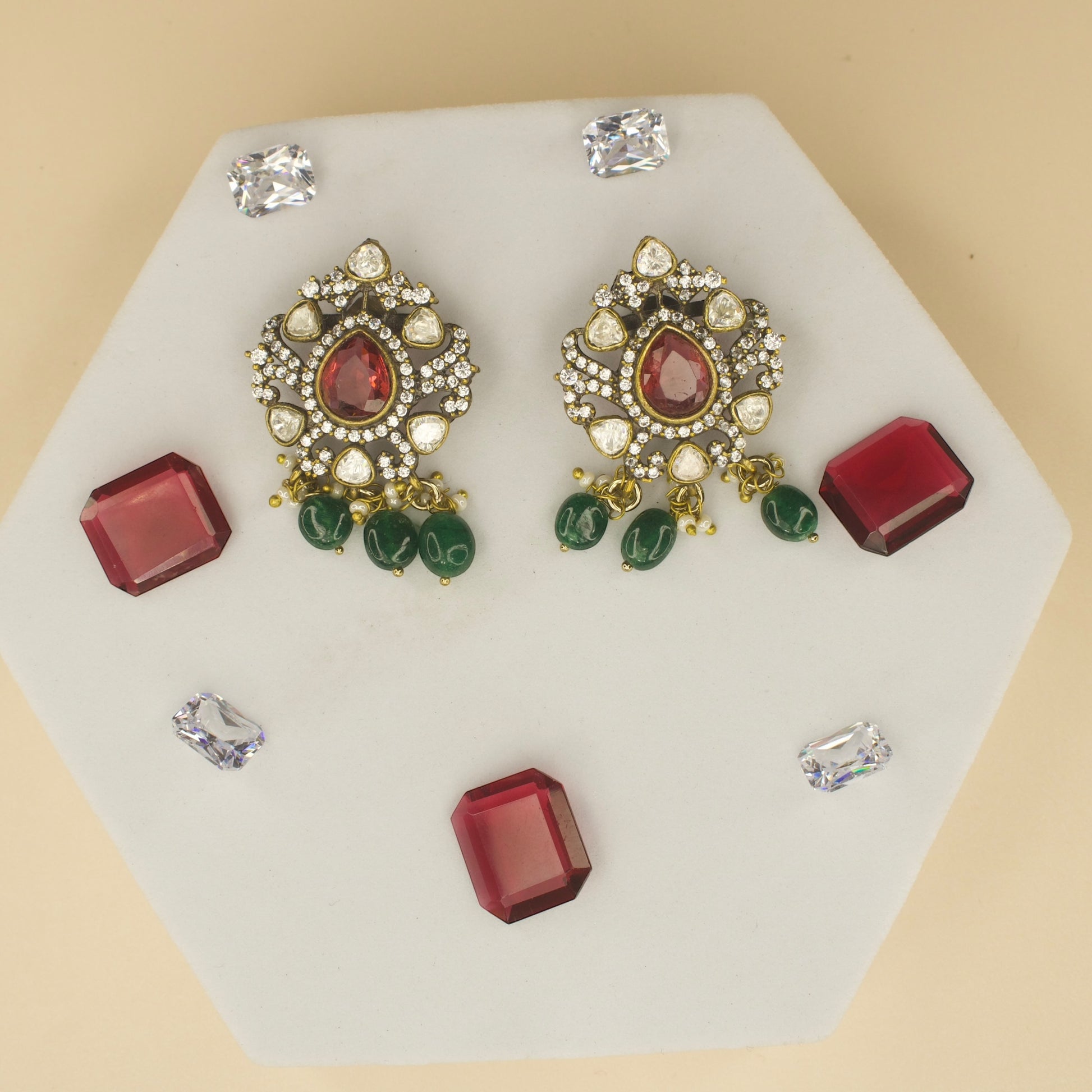 Polki studded Victorian plated studs with high quality victorian finish. available in ruby and green