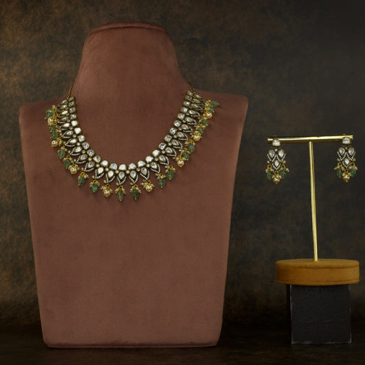 Gorgeous Victorian Necklace Set with Polki & AD Explore the Minimalistic Short Victorian Polki Necklace Set, featuring elegant designs with a classic Victorian finish. Perfect for timeless elegance. Shop now at Dulhan Jewels.