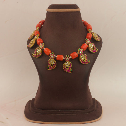 Vibrant Jadau Kundan Necklace with Coral Beads and Paisley Pendants