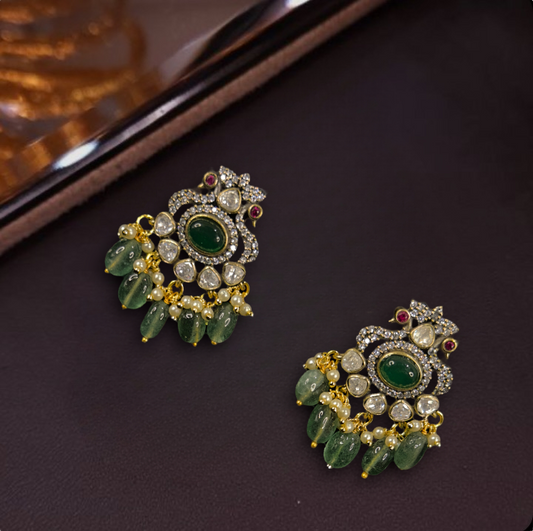 Peacock design Victorian polki Studs with Russian beads & pearl drops. This Victorian Jewellery is available in a Green colour variant. 
